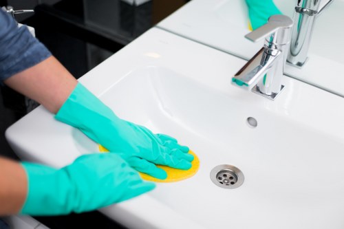 Technician treating stains during commercial carpet cleaning in Whetstone