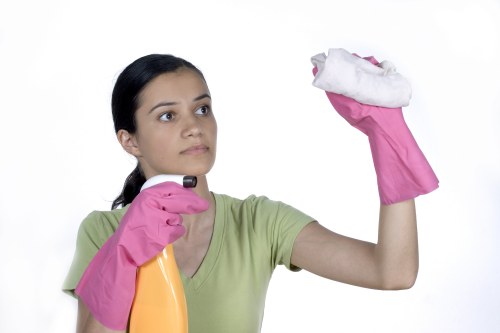 Carpet cleaning staff applying safety procedures during a job