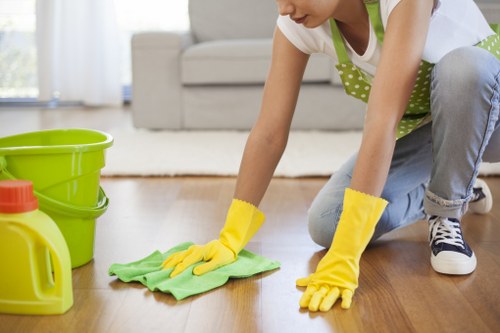 Technician wearing PPE during a professional carpet cleaning job